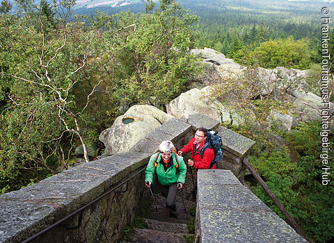 Hiking at the Kösseine House on top of the Kösseine Rock in the Fichtelgebirge Mountains